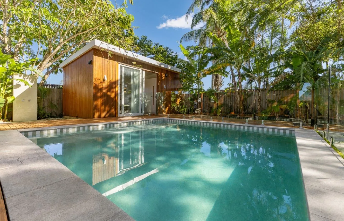 Holiday home with a pool, timber cabana and tropical garden